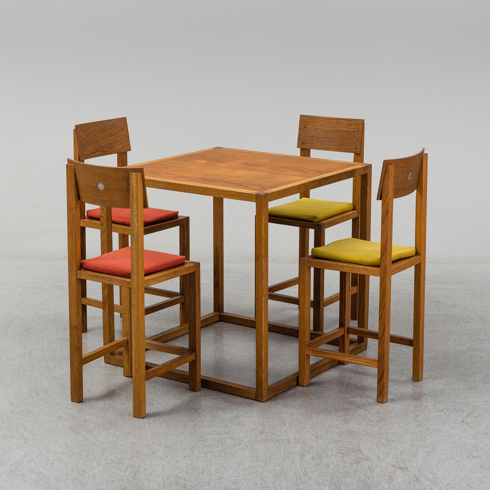 MARIO PRANDINA, an oak table and four chairs, Plinio Il Giovane, Italy.