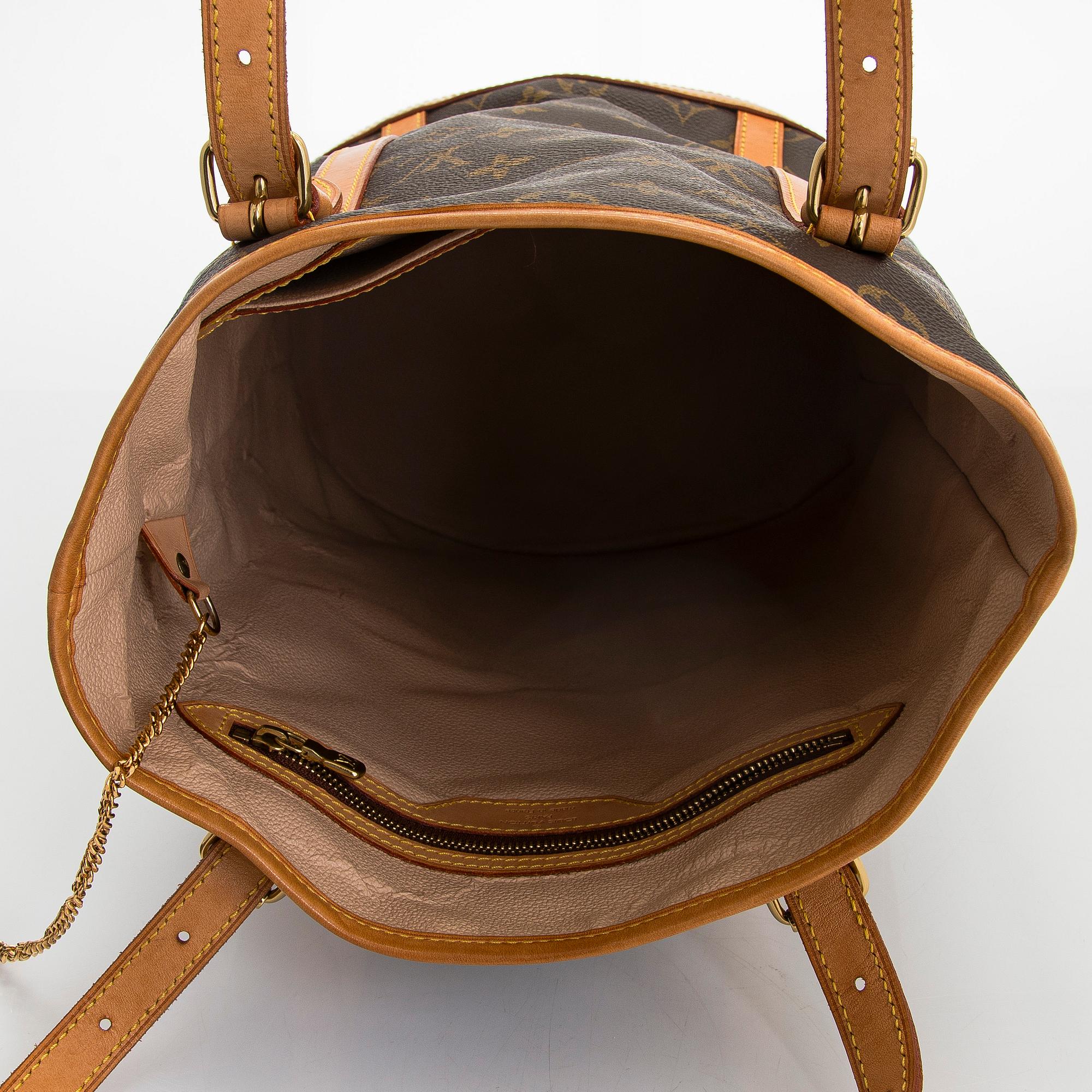 Louis Vuitton, a Monogram Canvas "Bucket" bag and pochette.