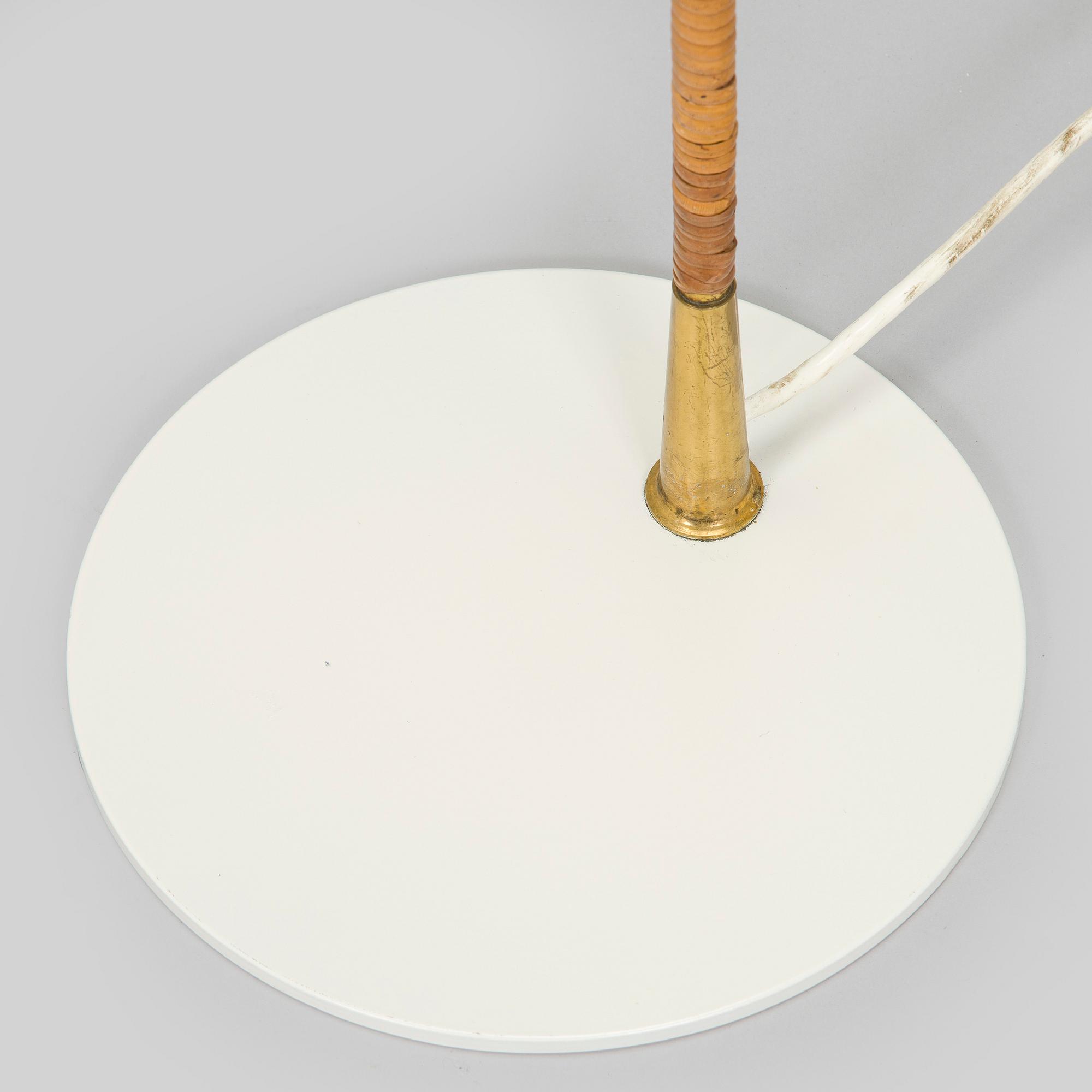Paavo Tynell, a mid-20th century K10-10 floor lamp for Taito.