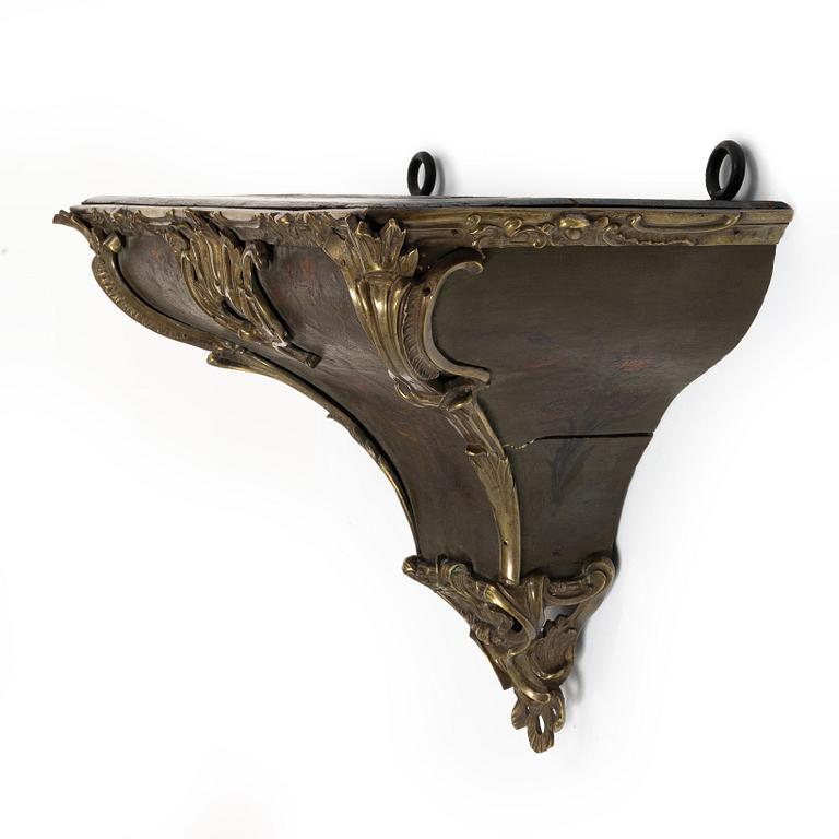A presumably French Louis XV bronze-mounted console, mid 18th century.