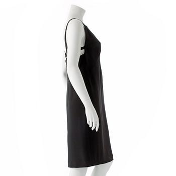 ESCADA, a black cocktail dress with rhinestones.