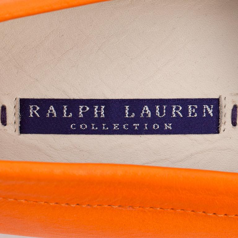 RALPH LAUREN, a pair of orange leather loafers. Size US 8 1/2B.