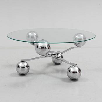 A 1960s / 70s coffee table with glass top.