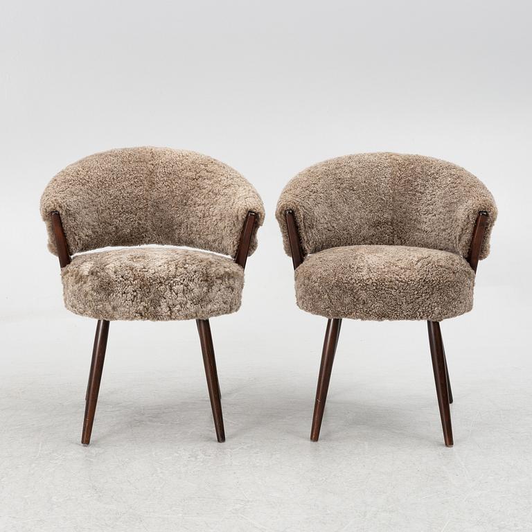 A pair of upholstered armchairs, AB Bröderna Biörs Snickerifabrik, Sweden, 1950's.