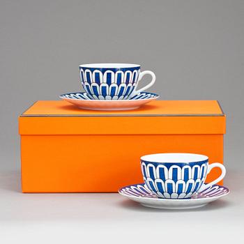 HERMÈS, a pai of blue and white porcelaine coffe cups, "Bleus d'Ailleurs".