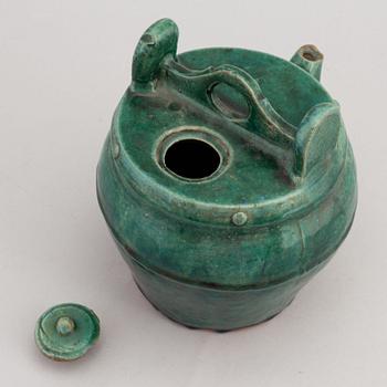 A Chinese green glazed 'Shiwan' ceramic teapot in the shape of a water bucket, 19th Century.