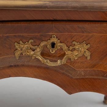 A French Louis XV-style rosewood marquetry 'Bureau plat aux bustes de femmes", late 19th century.