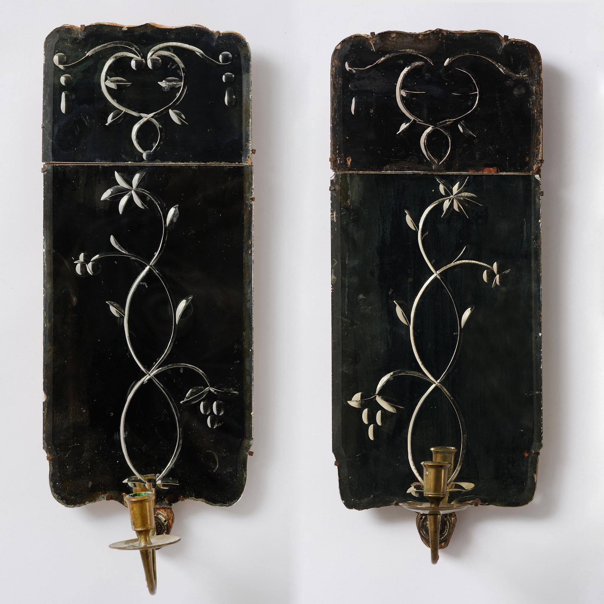 A pair of Swedish engraved-glass one-branch girandole mirrors, later part 18th century.