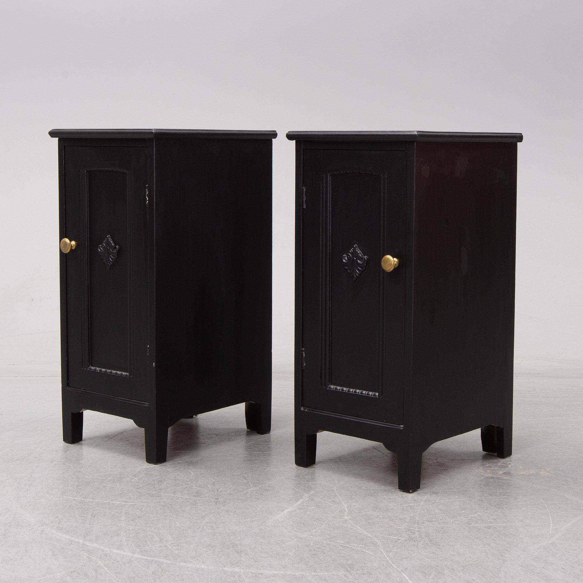 A pair of early 20th century bedside tables / cupboards.