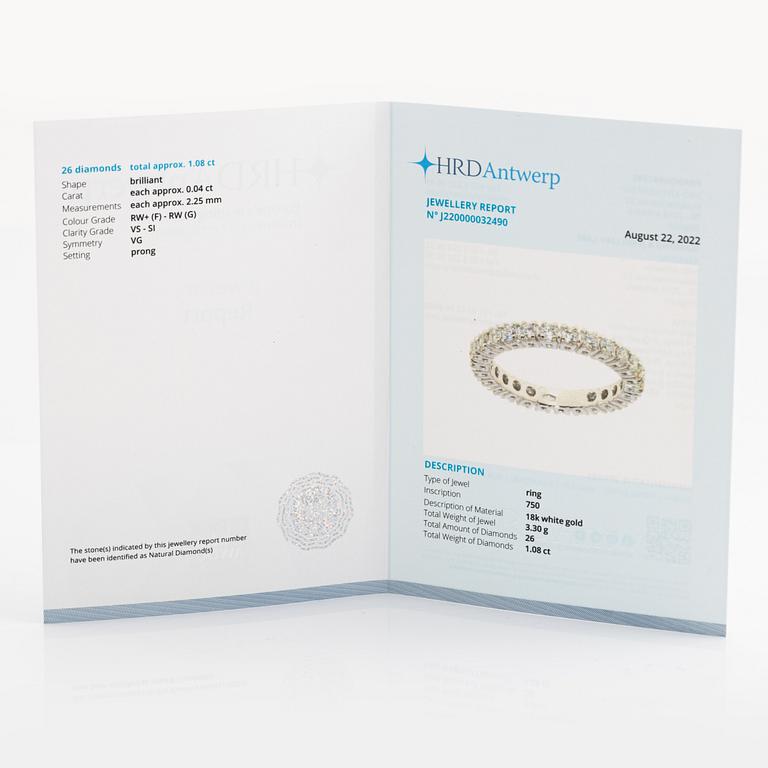 Brilliant cut diamond eternity ring.