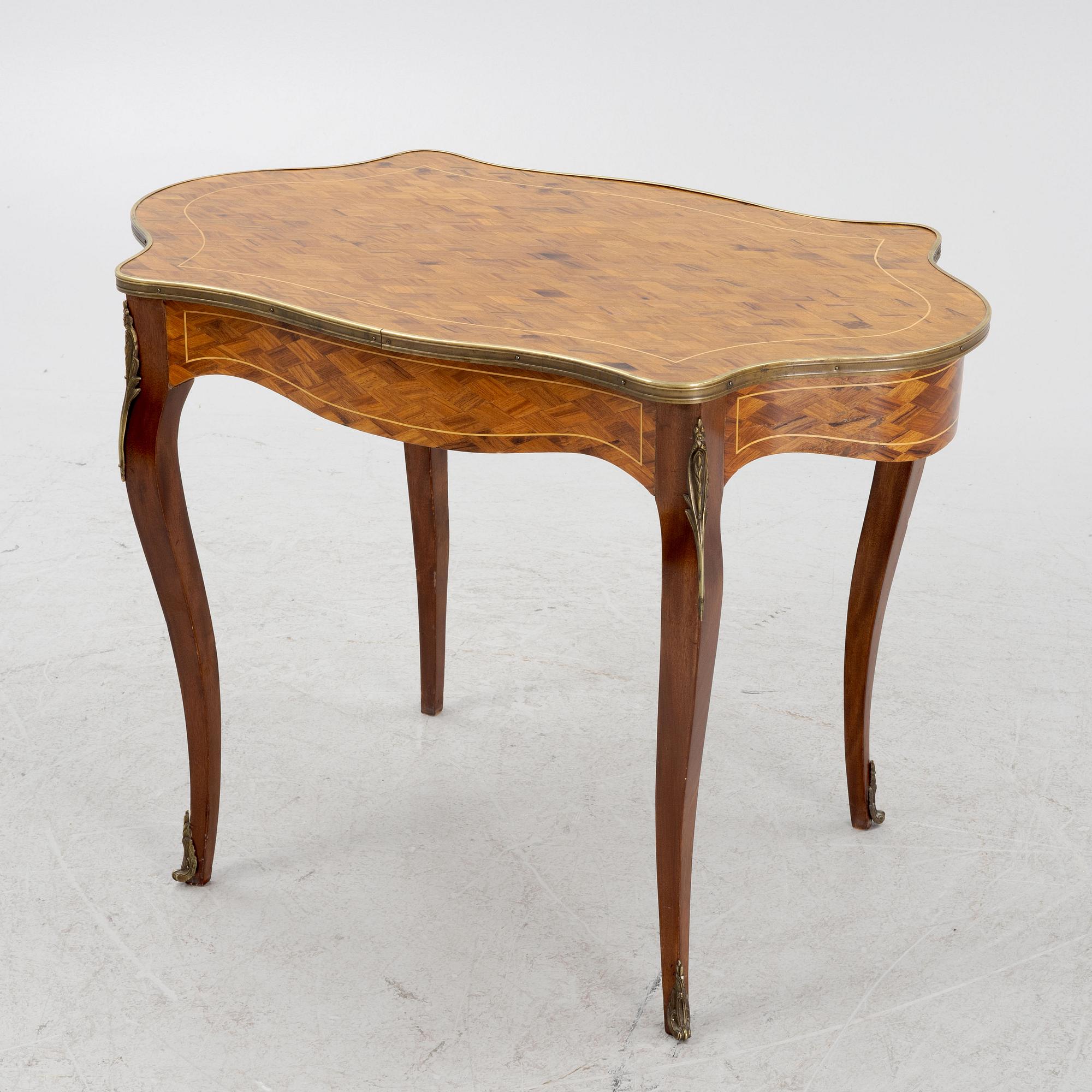 A Rococo style table, early 20th Century.