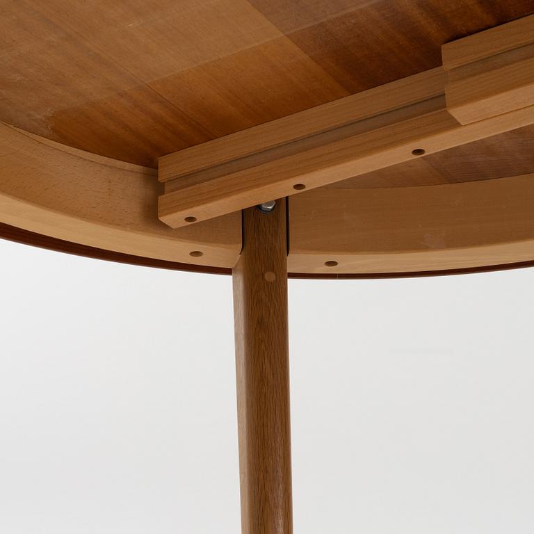 Karl Erik Ekselius, a teak-veneered dining table, JOC, Vetlanda, Sweden, 1960's.