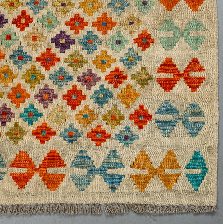 A carpet, kilim, ca 238 x 174 cm.