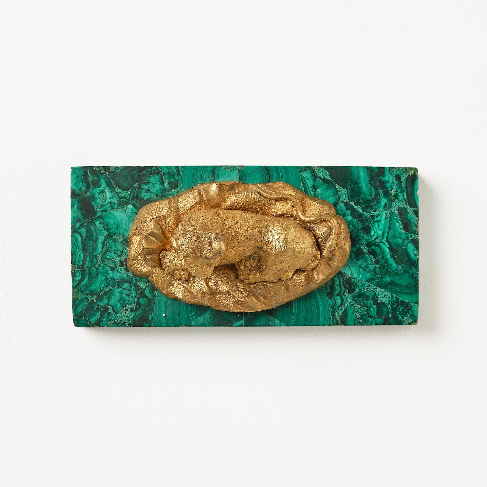 A Russian Nicholas II malachite-veneered and gilt-bronze paperweight, late 19th century.