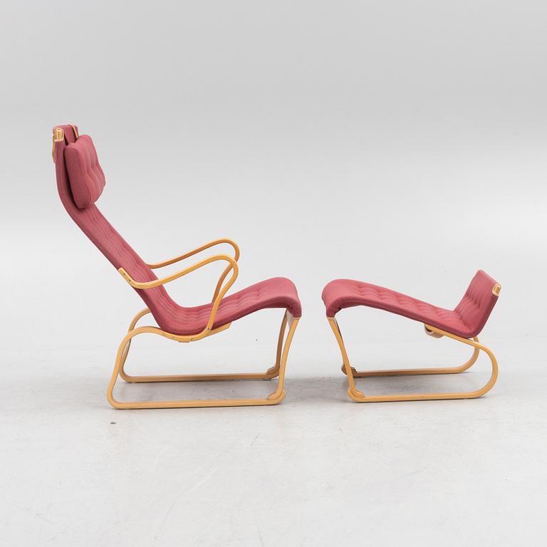 Bruno Mathsson, a 'Migo' armchair with a foot stool, Mathsson International, Värnamo.