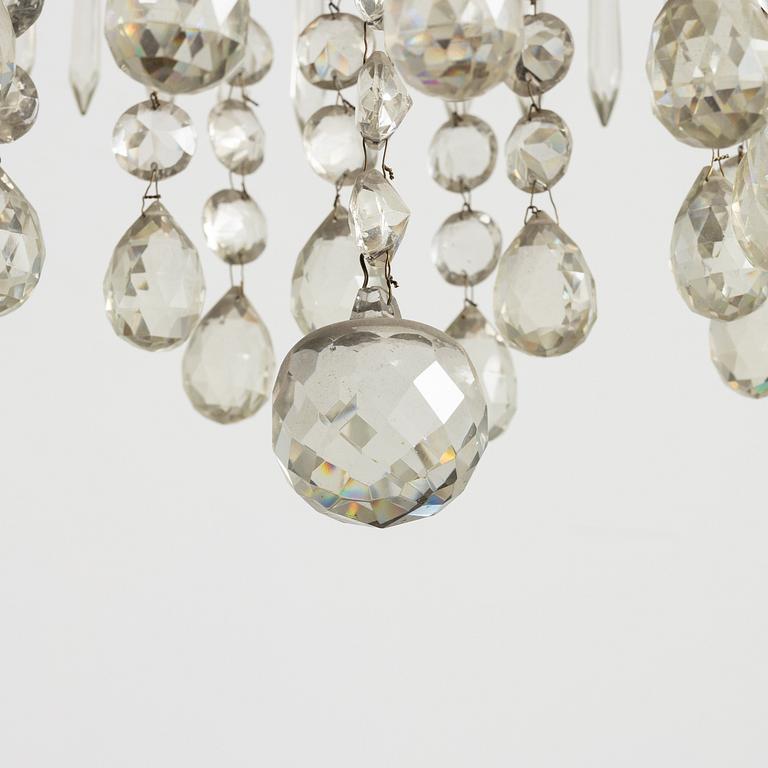 A four-light Gustavian-style chandelier, circa 1900.