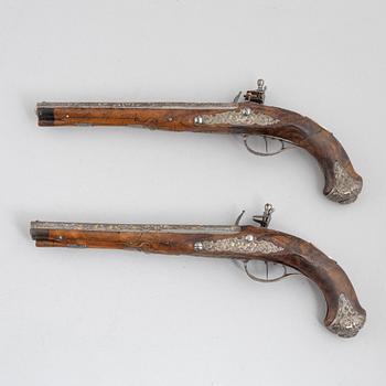 A Pair of flintlock pistols, by Johann Jacob Kuchenreuter, (Regensburg 1709-1783, Royal gunsmith).