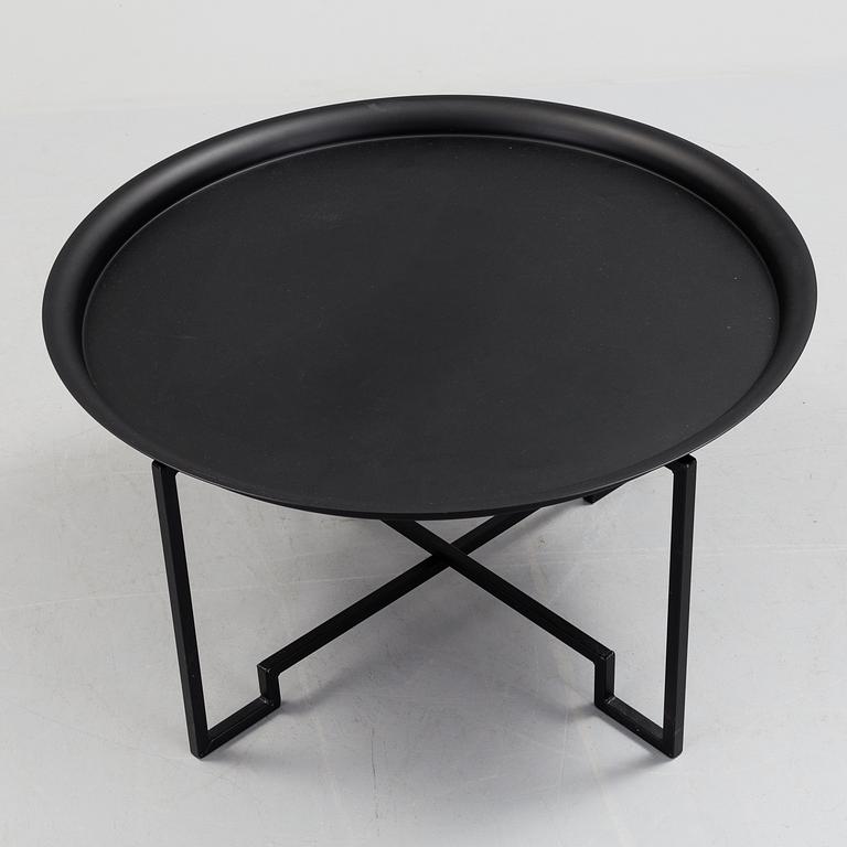 A coffee table designed in 2000 by Per Öberg for Svensk Tenn.