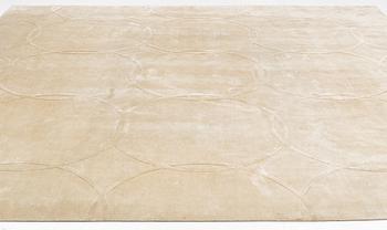 A carpet 360 x 360 cm.
