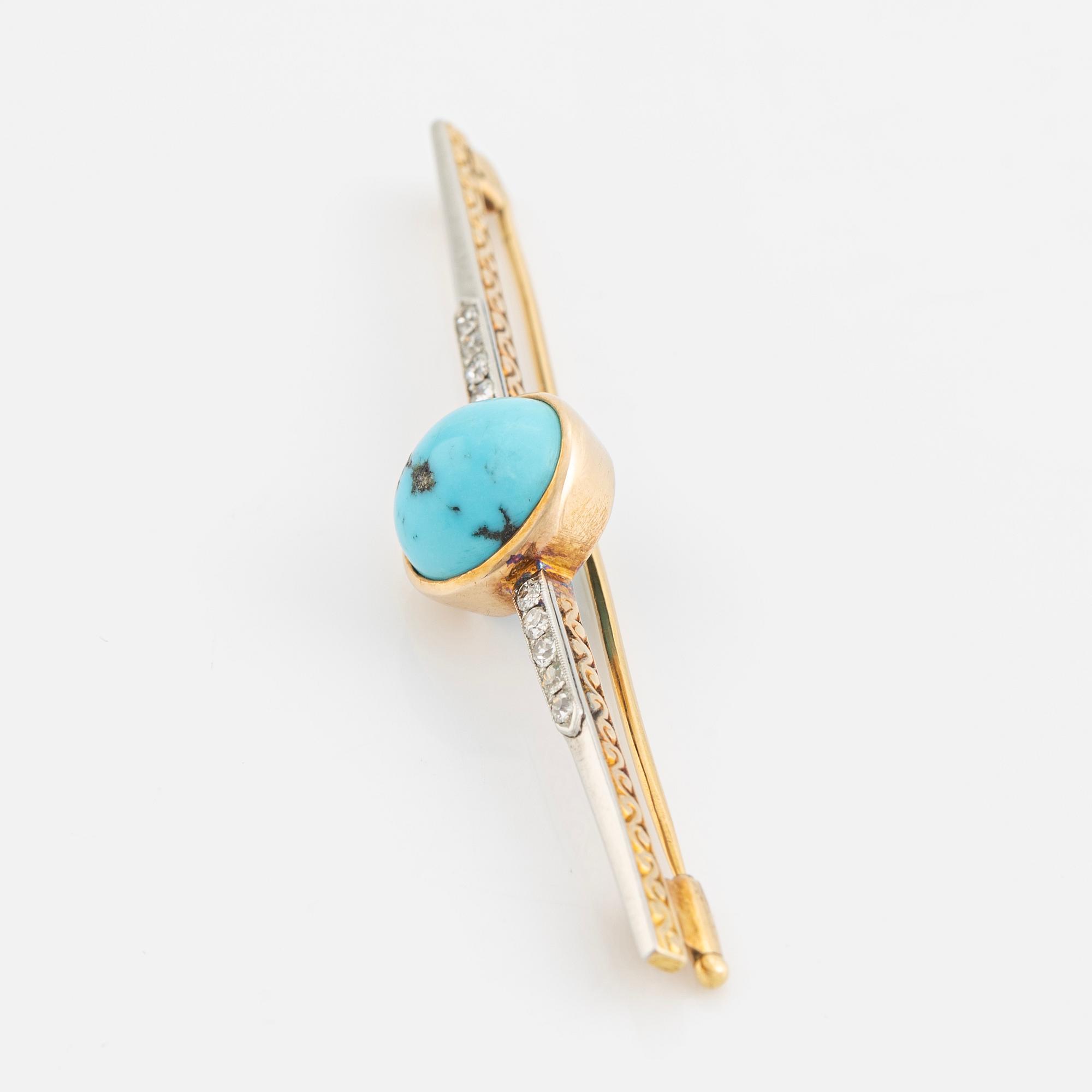 An 18K gold brooch set with a turquoise and old-cut diamonds.