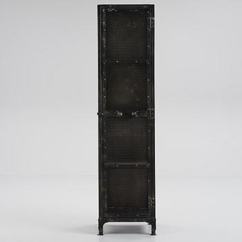 A contemporary patinated metal cabinet.