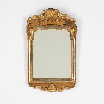 A Swedish rococo giltwood mirror, later part 18th century.