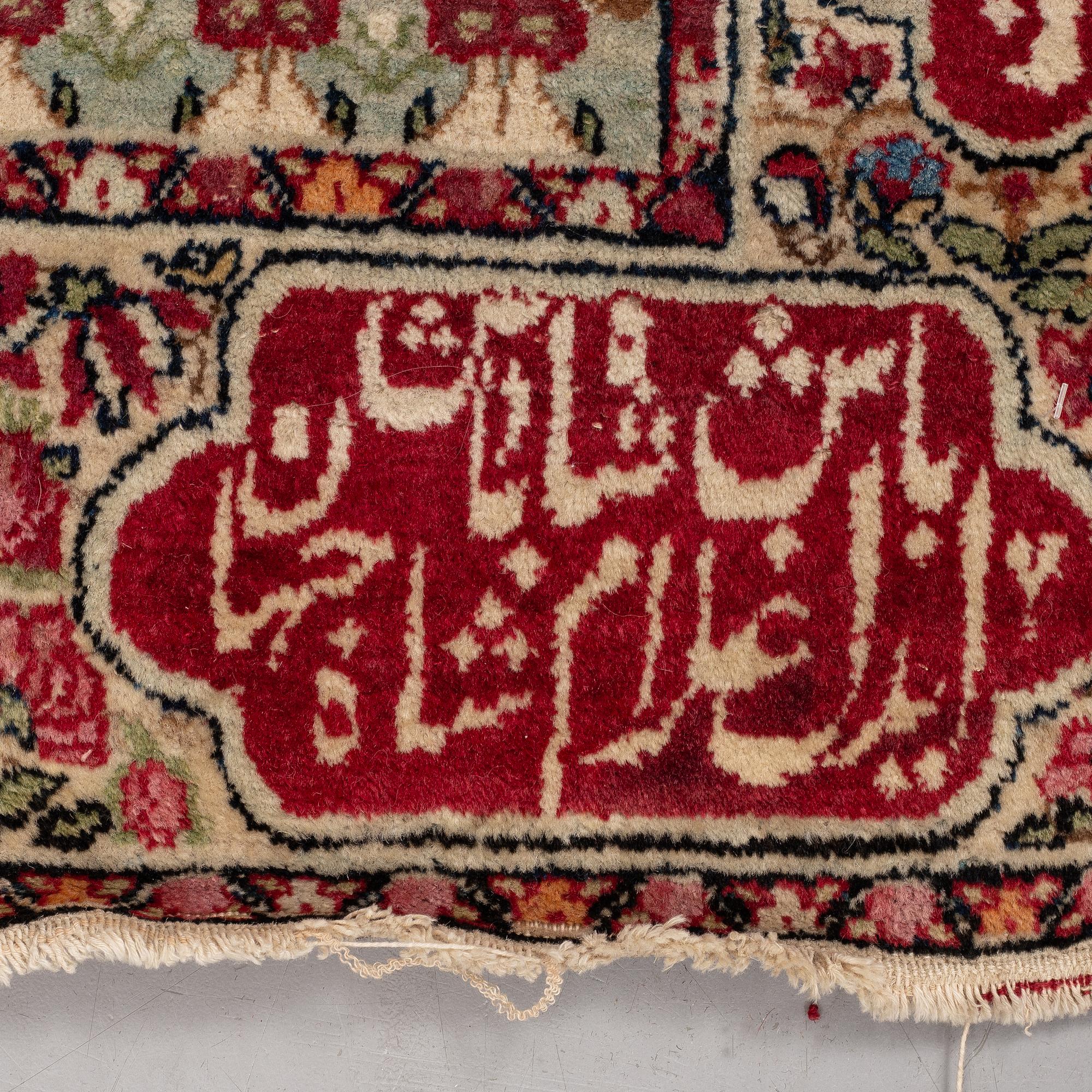 A rug, Antique Kerman Laver figural, ca 81 x 60 cm.