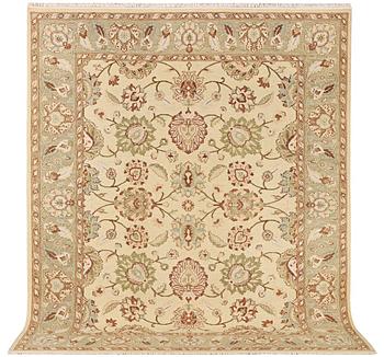 An oriental carpet with mamluk design, c. 294 x 250 cm.