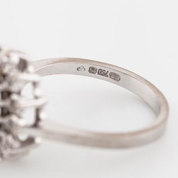 A sapphire and brilliant cut diamond ring with Swedish hallmark.
