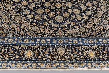 A carpet, Kashan signed, ca 395 x 277 cm.