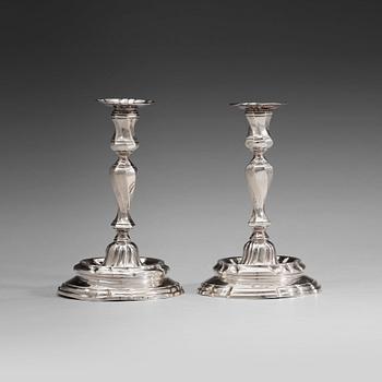 432. A pair of Swedish mid 18th century silver candlesticks, marks of Petter Åkerman, Stockholm 1756.