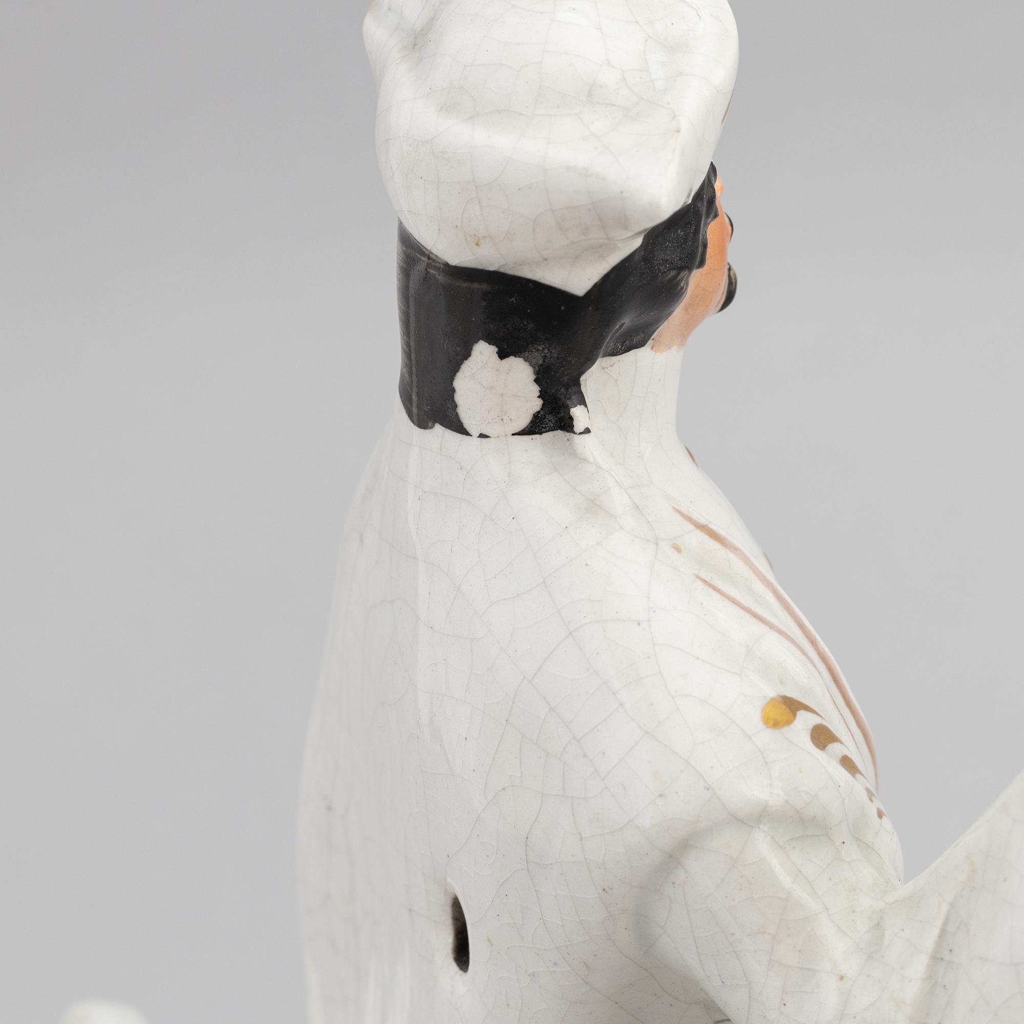 A set of eight English flintware figurines, 20th Century.
