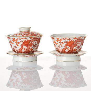 A pair of five clawed dragon bowls on stands and a cover, Qing dynasty, Daoguang mark and period (1821-50).