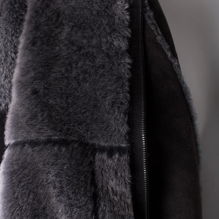 A Chanel Identification sheepskin jacket, French size 40.