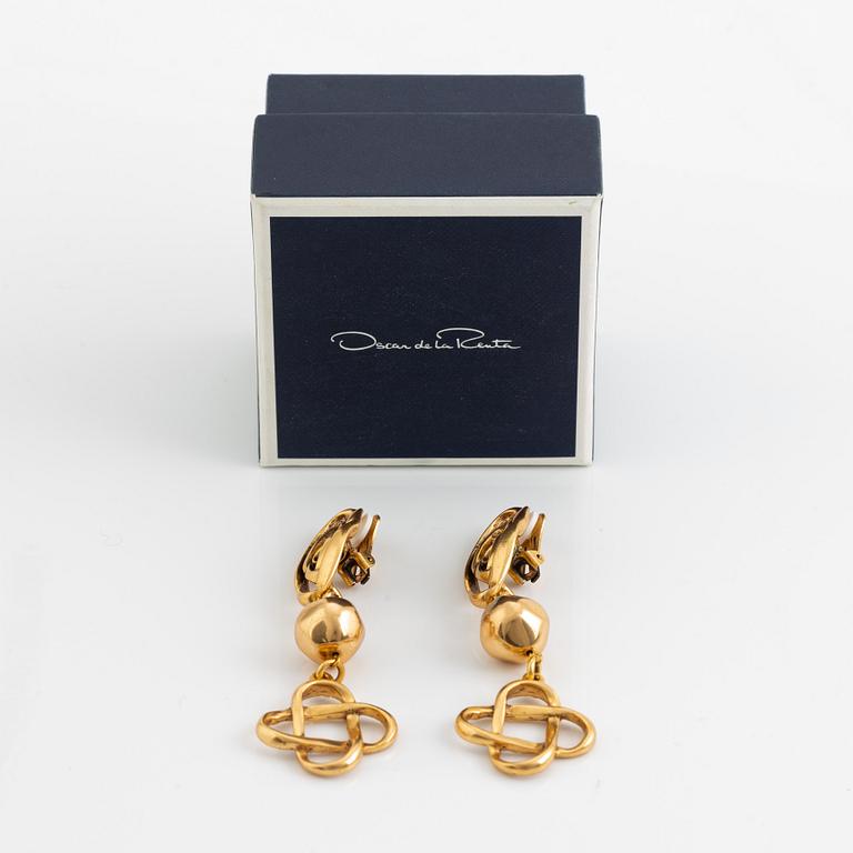 Oscar De La Renta clip earrings.