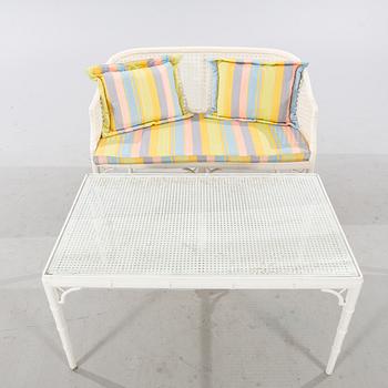 A late 20th century Miranda sofa and table.