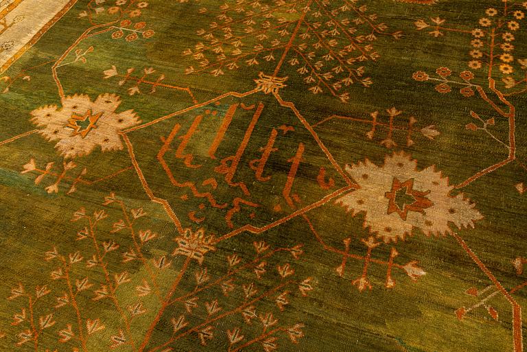 An antique Ushak carpet, Western Anatolia, c. 502 x 359 cm.