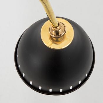 A bras wall lamp later part of the 20th century.