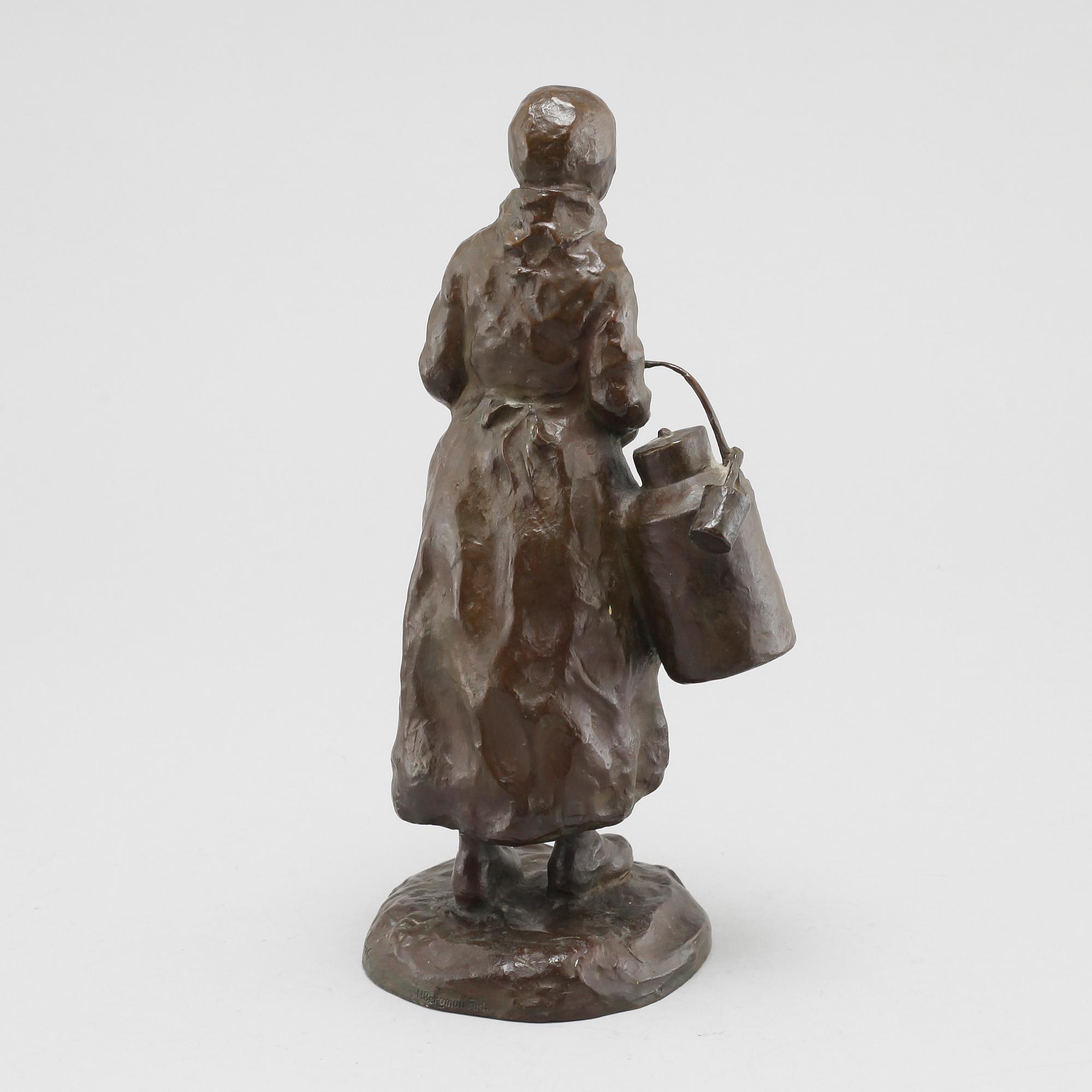 a bronze sculpture, signed and dated 1906.