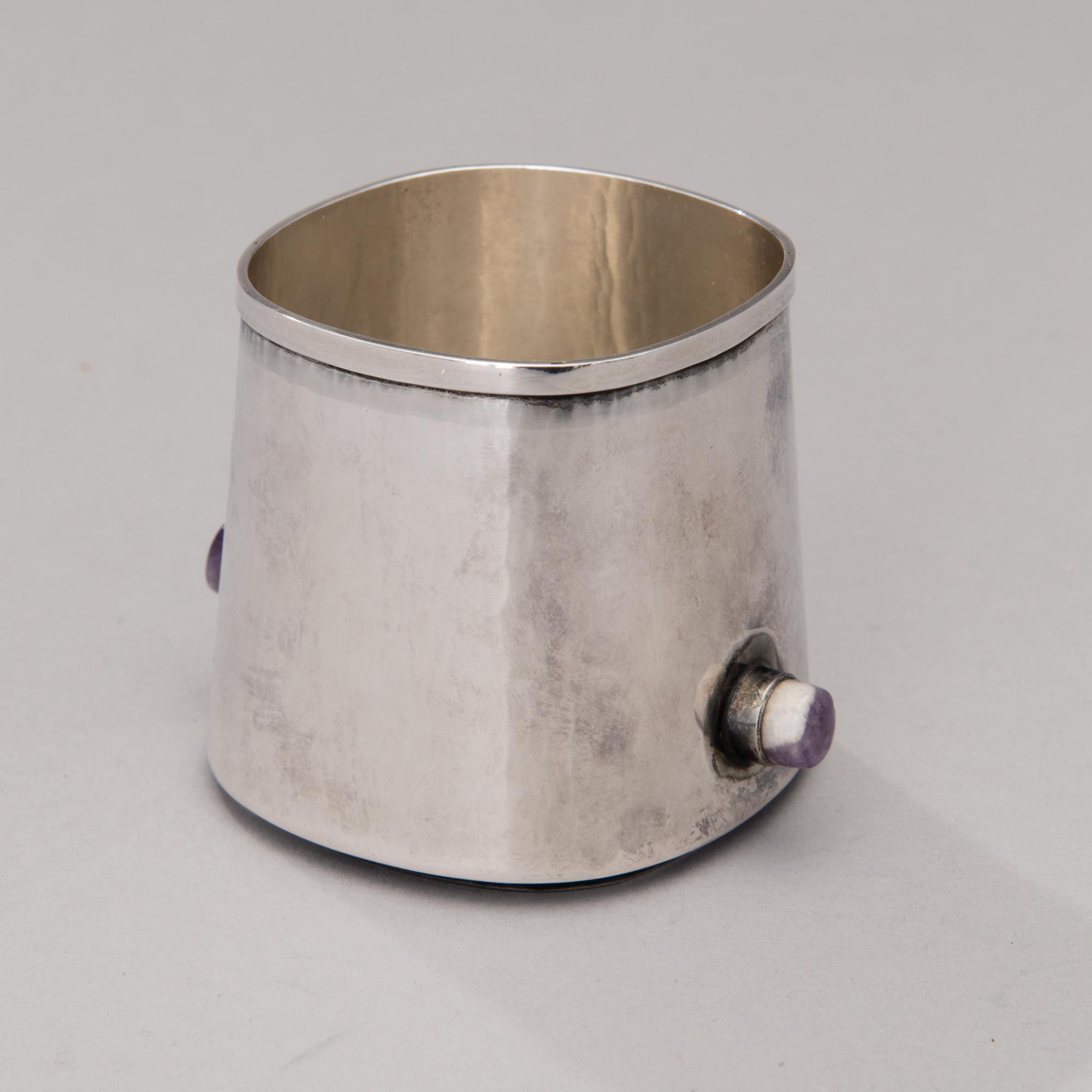 a silver bowl and a beaker with amethyst decor, mark of Reijo Sirkeoja, Hopeataidetakomo, Tampere Finland 1964-65.