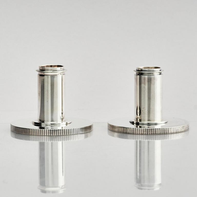 Georg Jensen, a pair of sterling silver candlesticks, design by Sigvard Bernadotte, model no 711A, Copenhagen, Denmark after 1945.