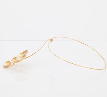 An 18K gold Wolfgang Gessl necklace.