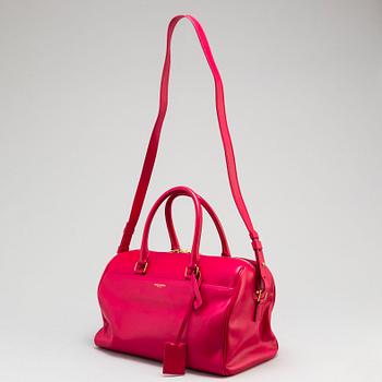 YVES SAINT LAURENT, a hot pink 'Classic duffle 6' bag.