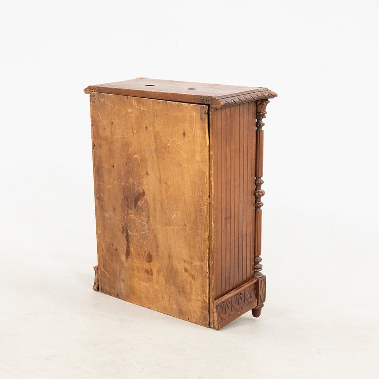 Cigar cabinet circa 1900.