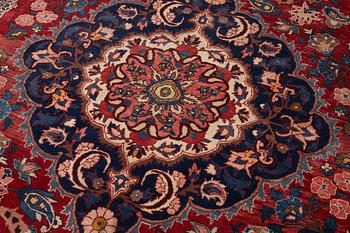 An Persian carpet, ca. 310 x 215 cm.