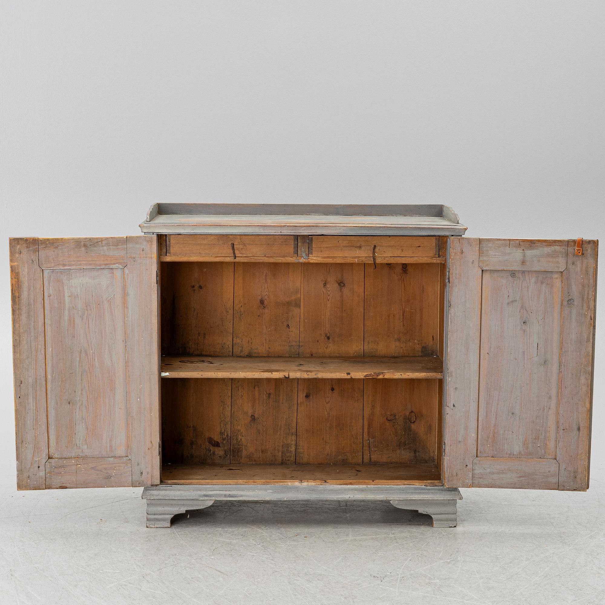 A Gustavian cupboard, circa 1800.