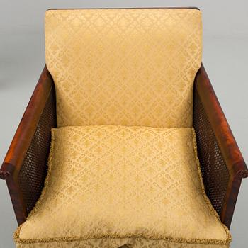 a pair of chippendale style armchairs from the 1930's/-40's.