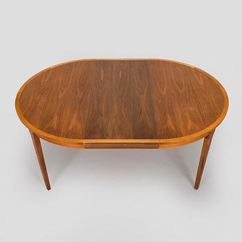A 1960s teak and oak dining table.