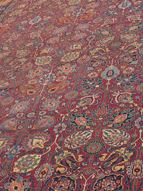 CARPET. Semi-antique Mashad probably. 533 x 317,5 cm.