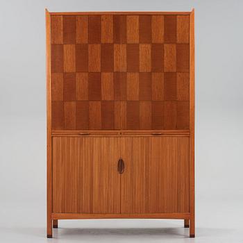 David Rosén, a mahogany and teak cabinet, for Stockholm's Association of Crafts, signed and dated 1959.